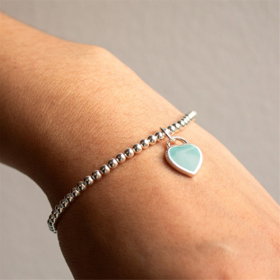 White Sterling Silver Turquoise Heart Bead Bracelet 
Top Width: 3mm