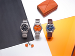 Load image into Gallery viewer, CITIZEN Men&#39;s Titanium Eco-Drive Dress Watch with Orange Dial
Collect
