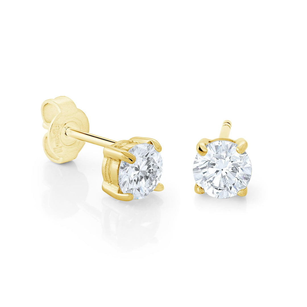 Gold Stainless Steel Round Cubic Zirconiums Stud Earrings
Dimensions: