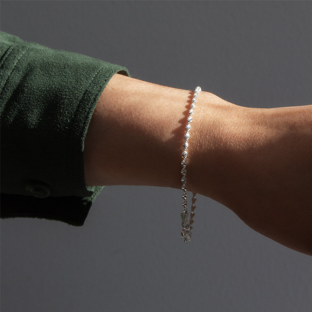 White Sterling Silver Fancy Twisted Bracelet 
Top Width: 2.5mm