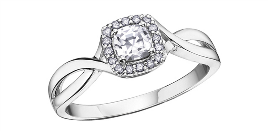 10K White Gold Halo Cubic Zirconium and Diamonds Ring
Primary Stone: