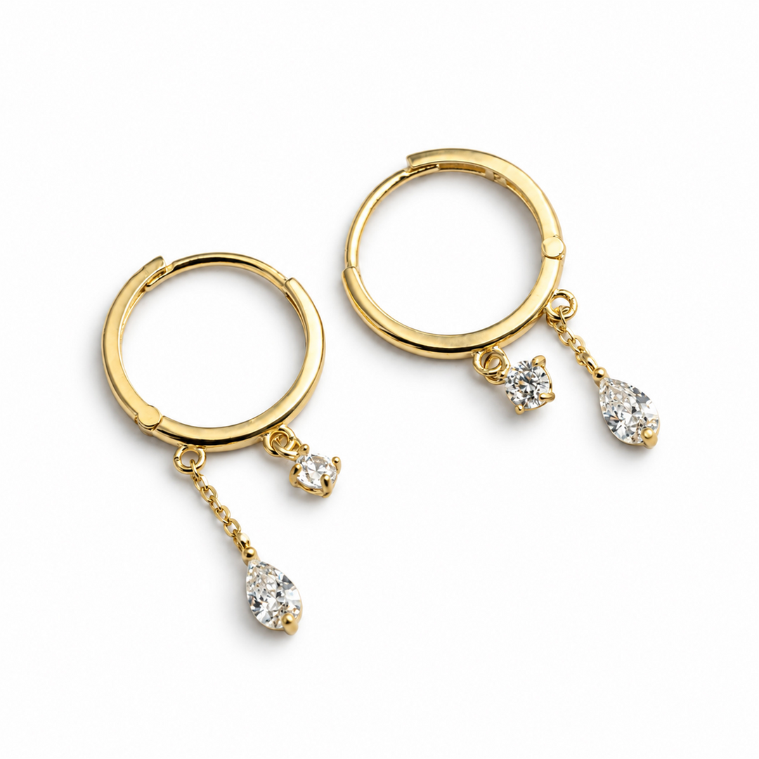 10K Yellow Gold Round Drop CZ Huggie Earrings
 
Dimensions: 13mm x 1
