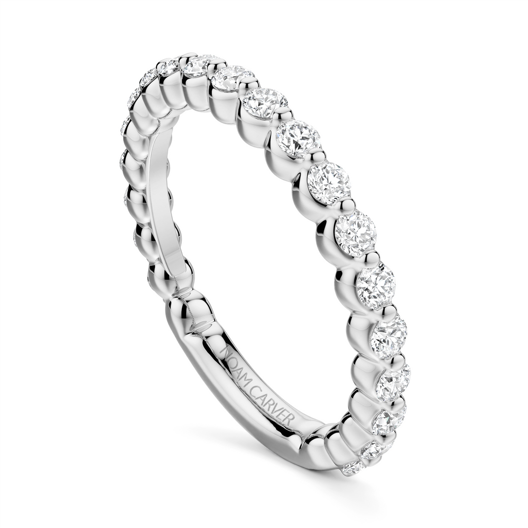 Lady's White Gold Prong Set Diamonds Band
Diamond Shape: Round
Total