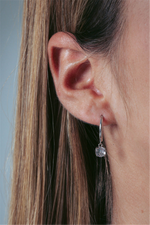 Load image into Gallery viewer, White Sterling Silver Cubic Zirconiums Dangle Polished Huggie Earrings
