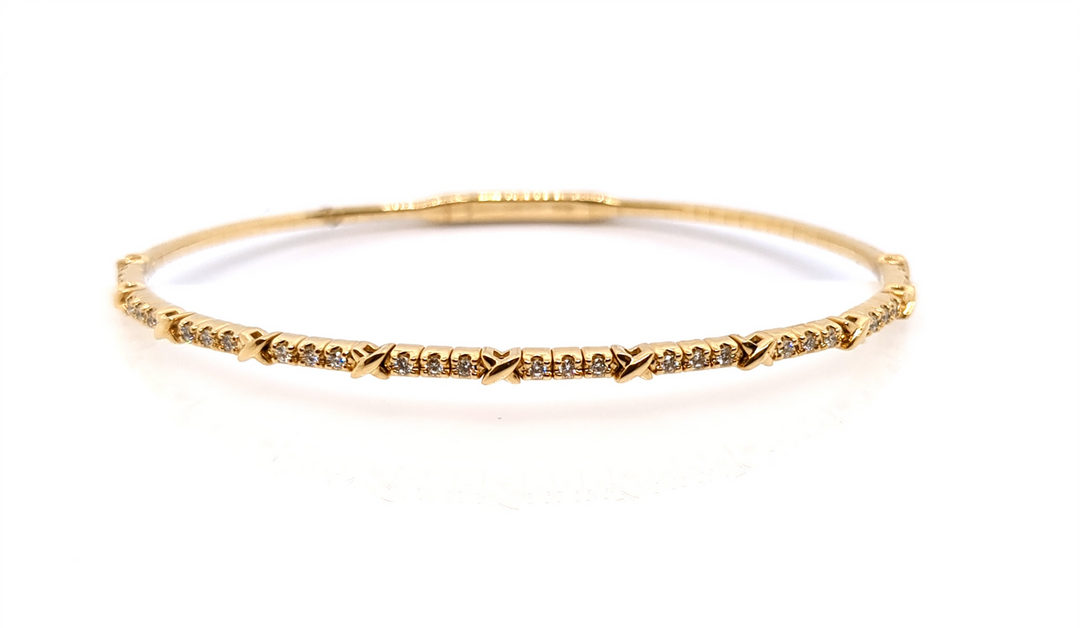 14K Yellow Gold Diamond Bangle 
Total Diamonds: 0.25 cttw SI1 I/J 
T